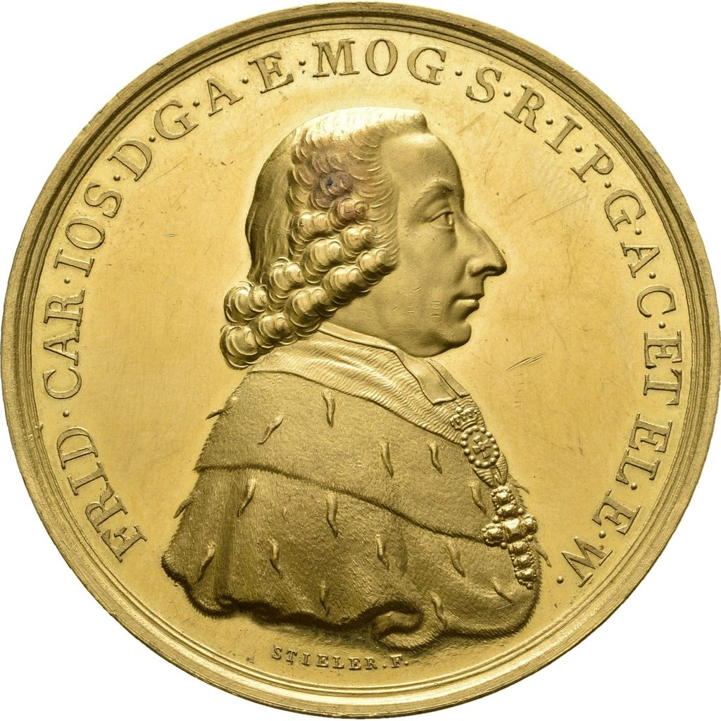 goldene Medaille mit dem Bild eines Bischoffs