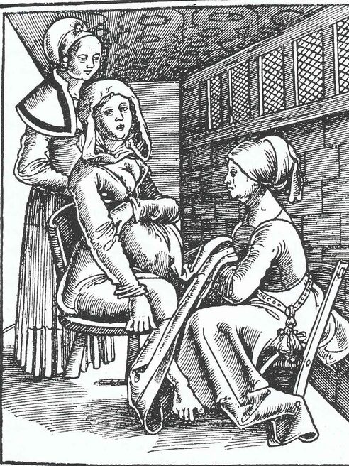 Gebärende mit Hebammen