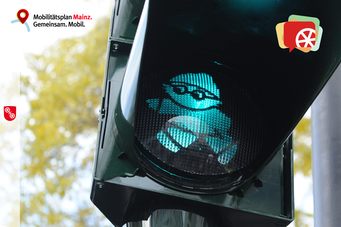 Bild einer grünen Mainzelmännchen-Ampel