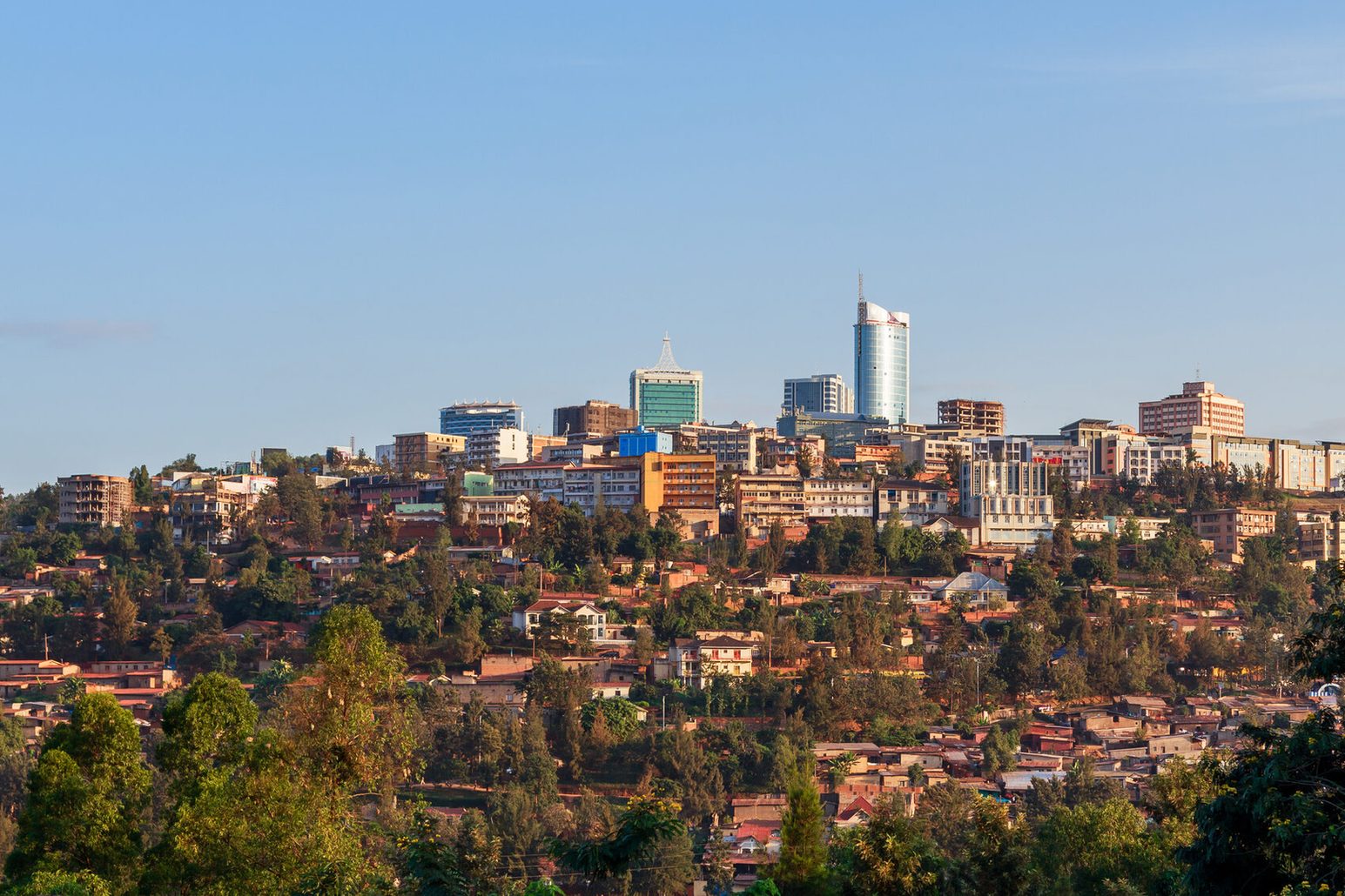 Skyline of Kigali with farm buildings