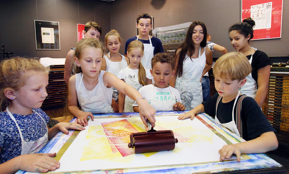 A workshop for children in the Gutenberg Museum's Print Shop.